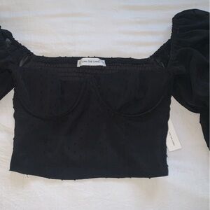 Black long sleeve bustier crop top with puff sleeves
